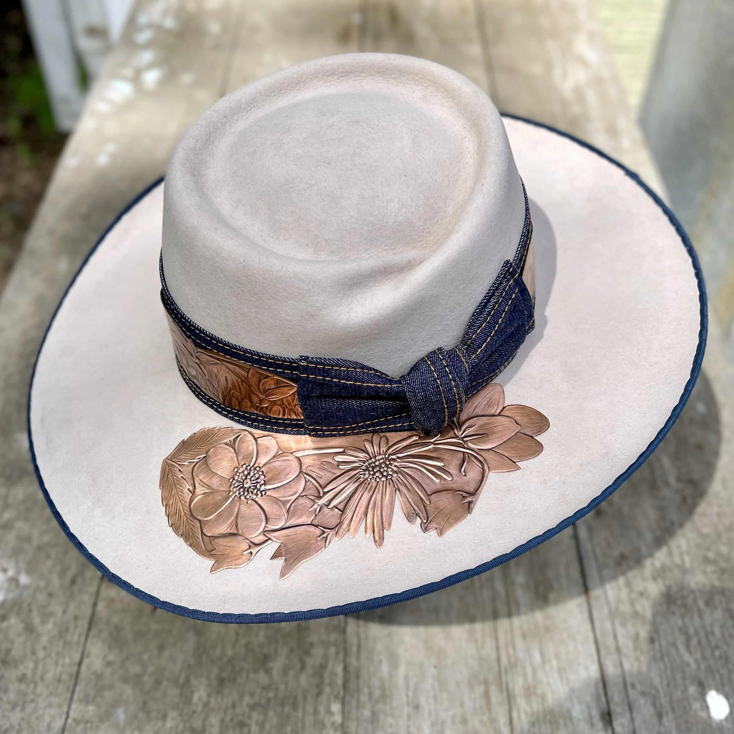 Erin Stelmaschuk Biegel artist, custom copper adorned cowboy hat, custom western hat, western art, prairie inspired.