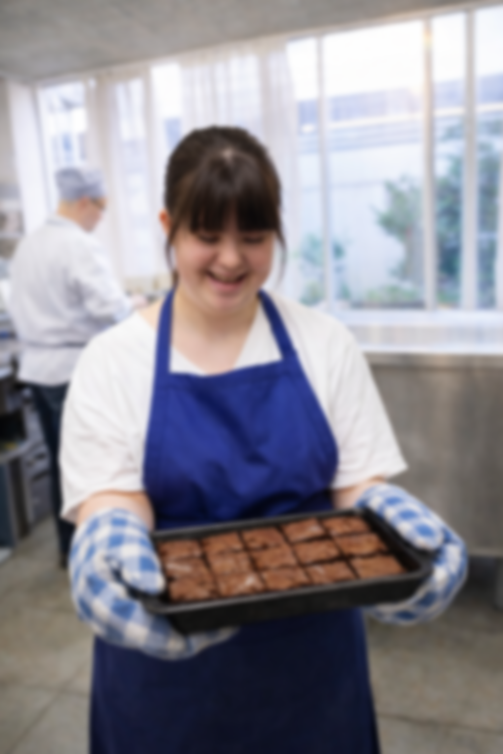 Young person preparing brownies during a structured, hands-on session