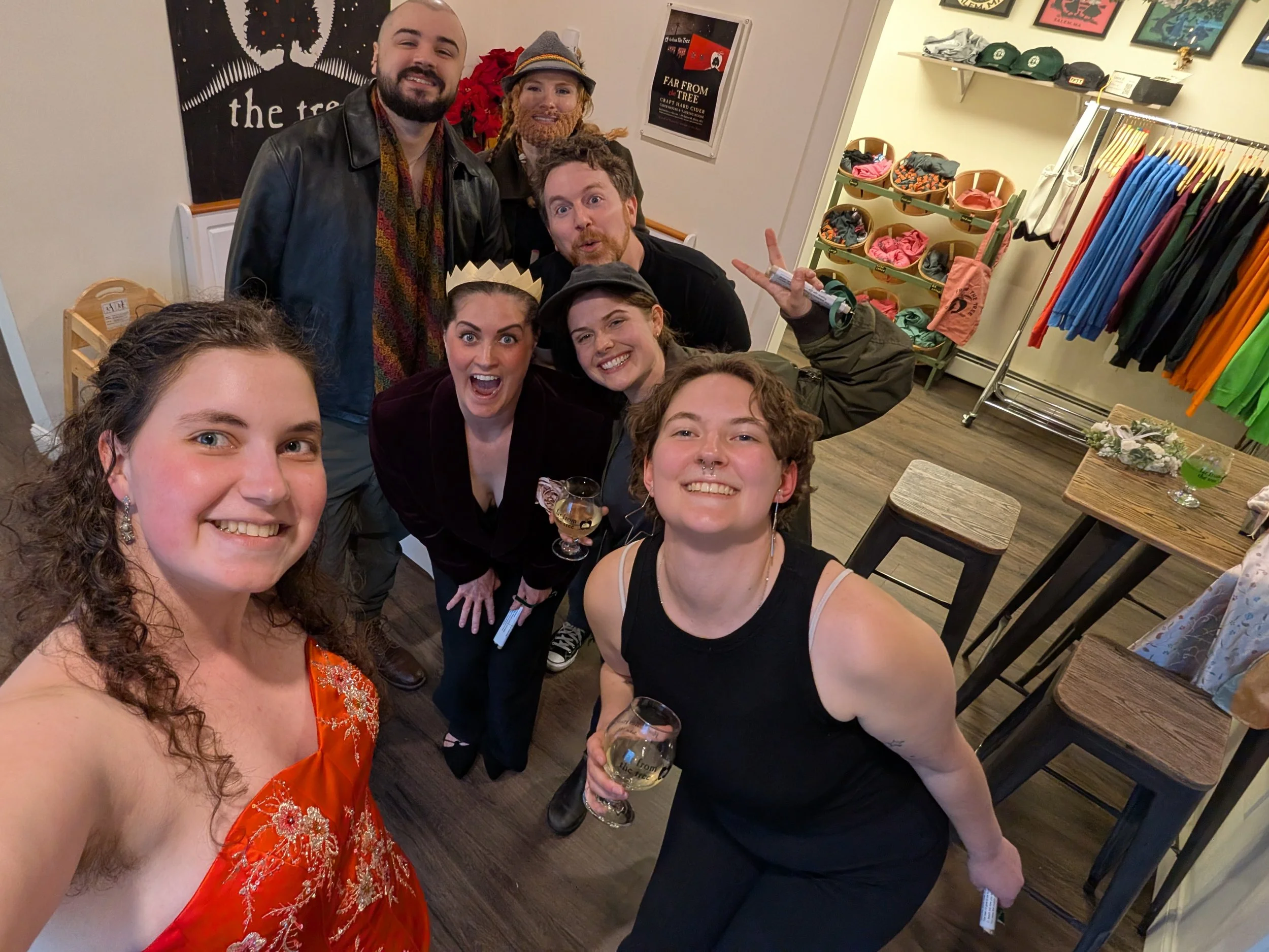 The VanGuard's cast smiling at the camera while backstage before a show.