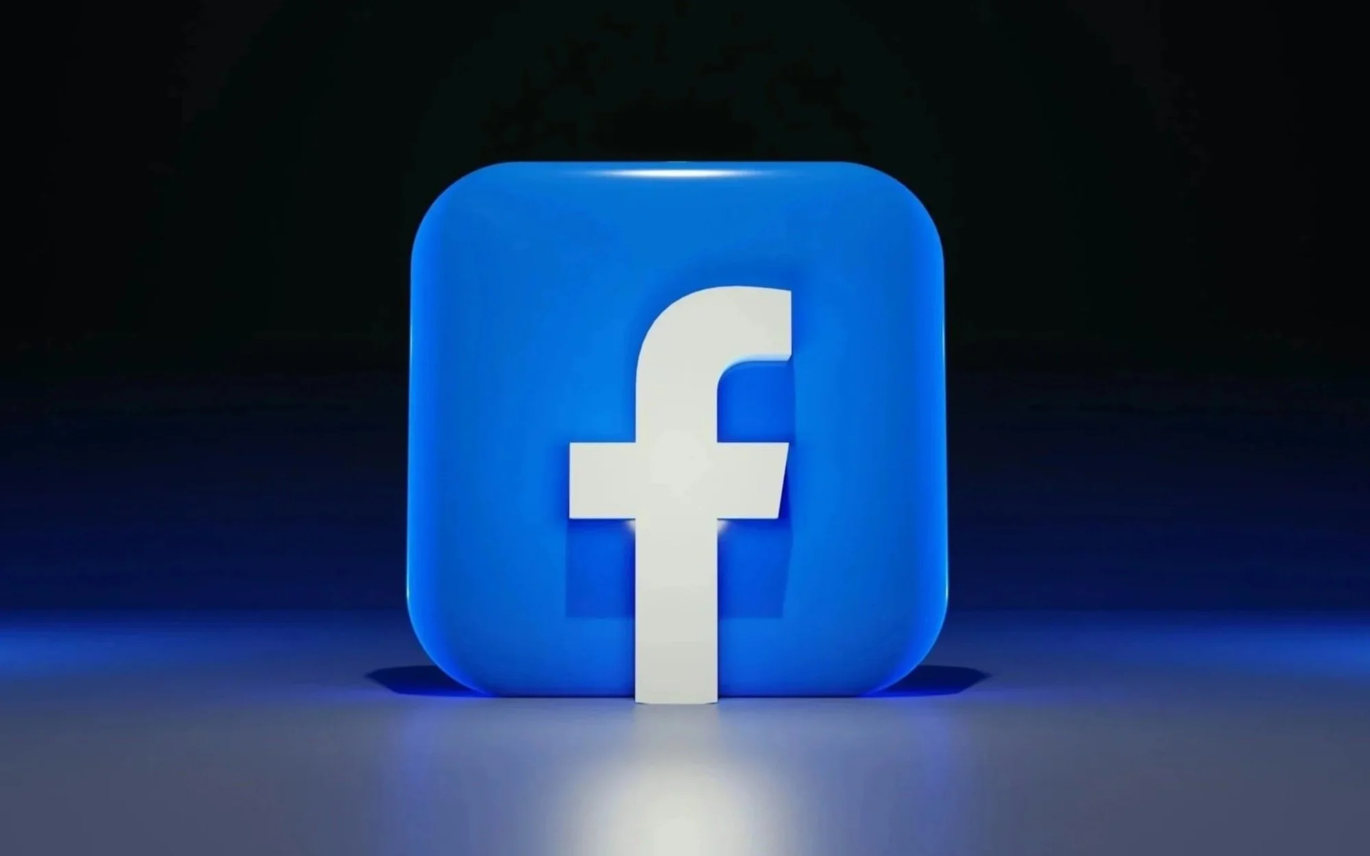 A stylized close-up of the Facebook logo, featuring a white lowercase 'f' on a blue rounded square background with a subtle spotlight effect.