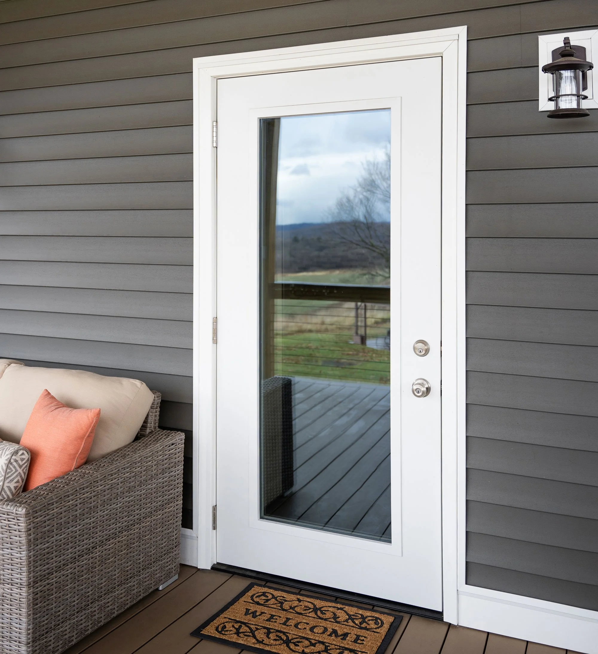 House with ProVia Legacy 460 Style Smooth Steel Entry Door in the color Snow Mist White