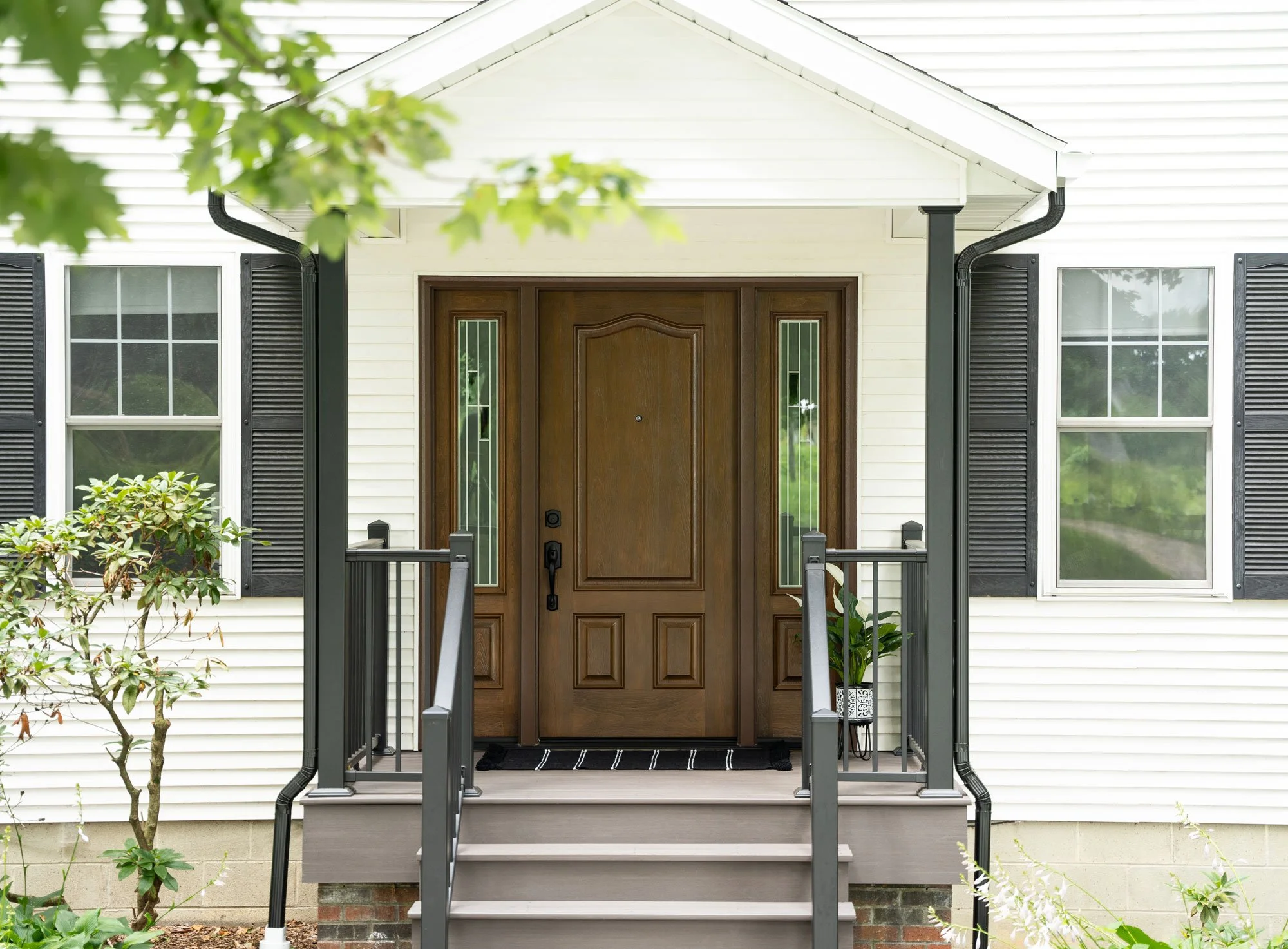 House with ProVia Natural-Bark 003 Style Signet Cherry Entry Door
