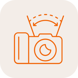 Simple illustration of a washing machine with doors open, showing the drum inside, with arrows indicating the opening and closing movement.