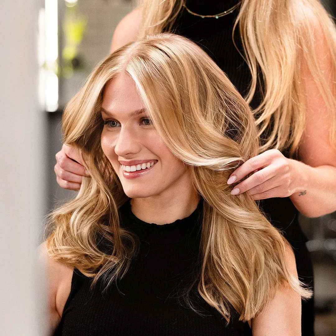 Hair stylist working with client at Lolamax Salon South Minneapolis