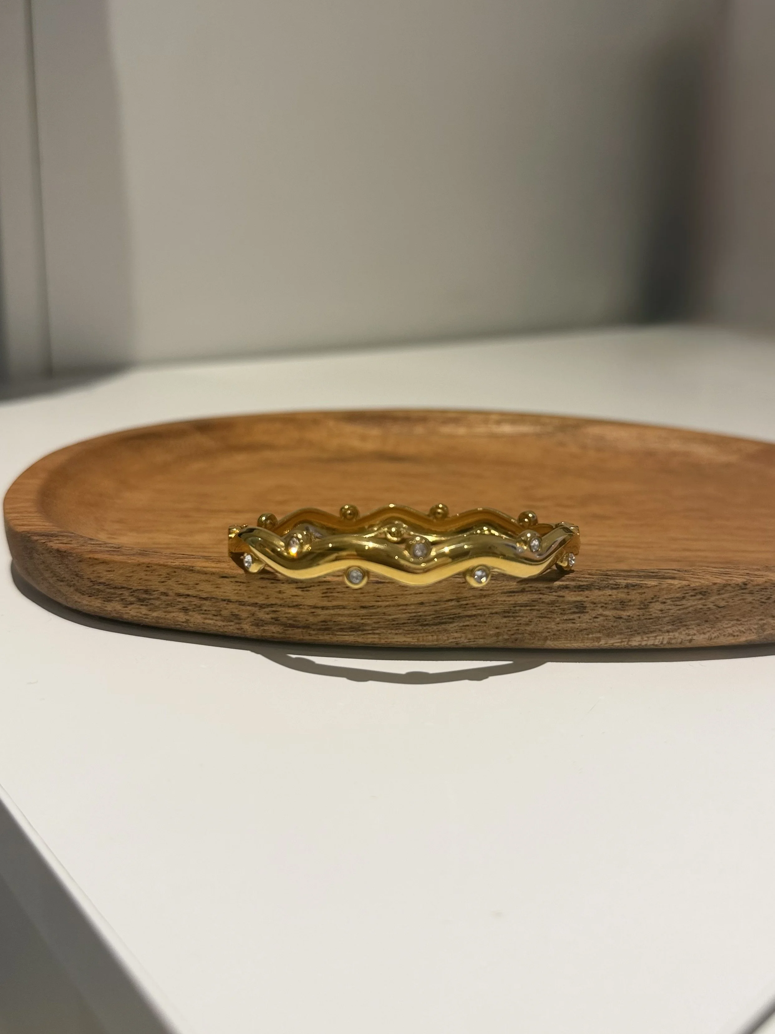 Gold Wavy Zirconia Hinged Bangle