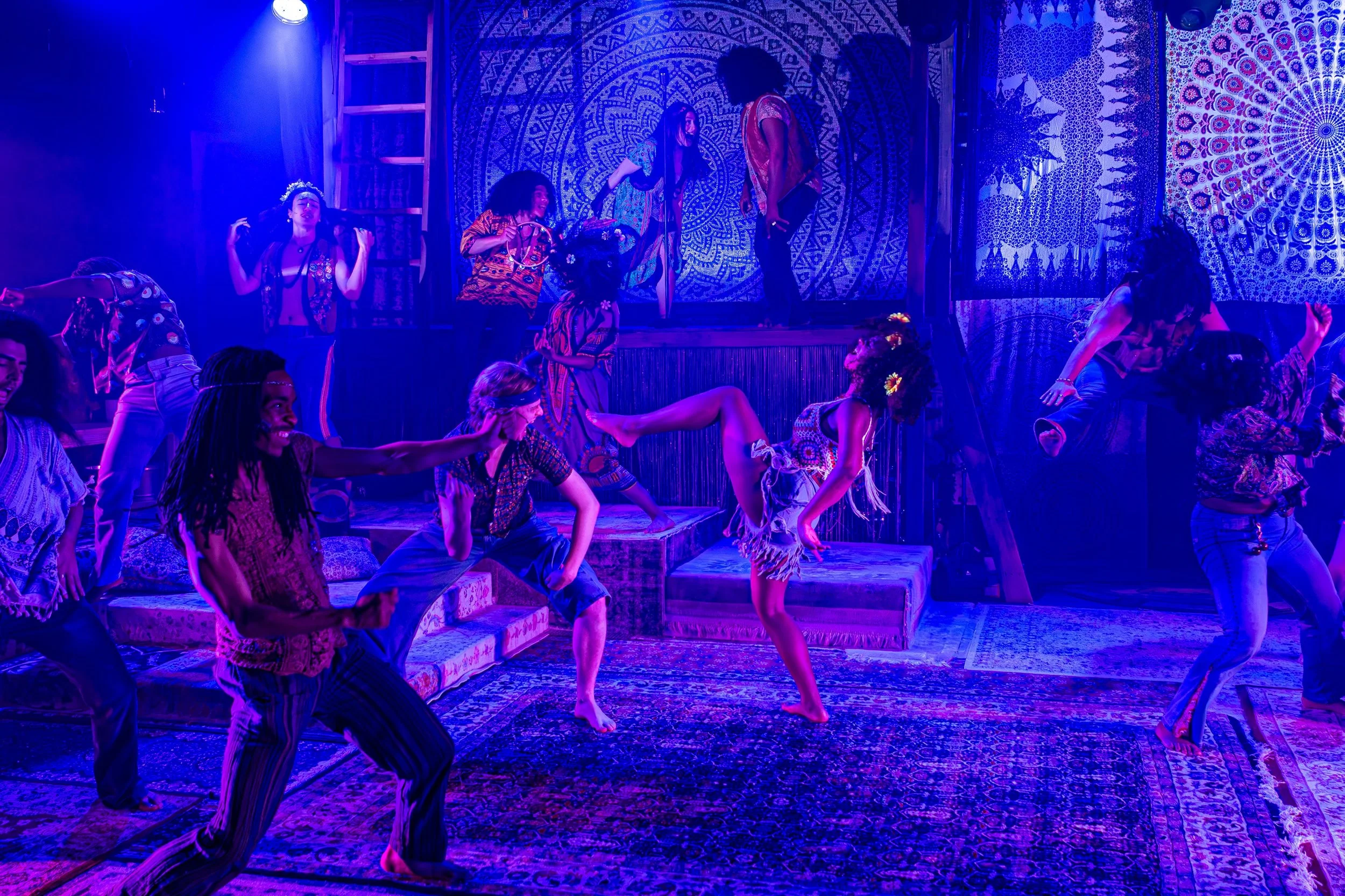 TRIBE MEMBER in Hair.