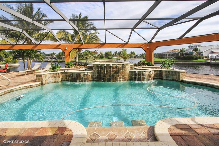 17_1930-SE-21st-Ter_29_Custom-heated-pool-spa-with-water-features_Web.jpg
