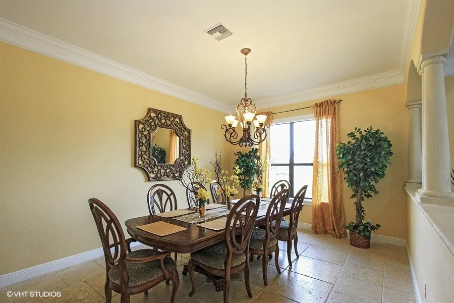 05_1930-SE-21st-Ter_2_Spacious-formal-dining-with-views-of-the-water_Web.jpg