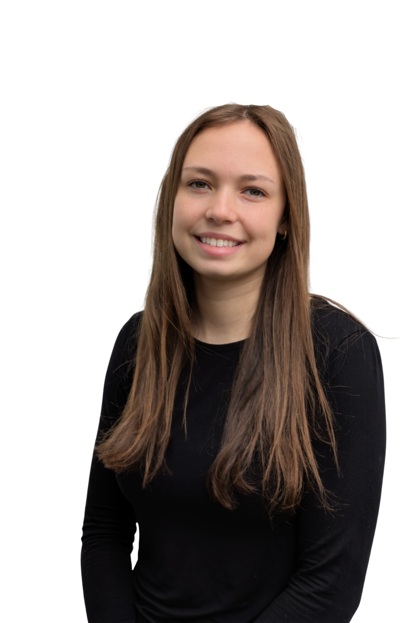 Portrait of a young woman with long brown hair, smiling, wearing a black top, against a white background.
