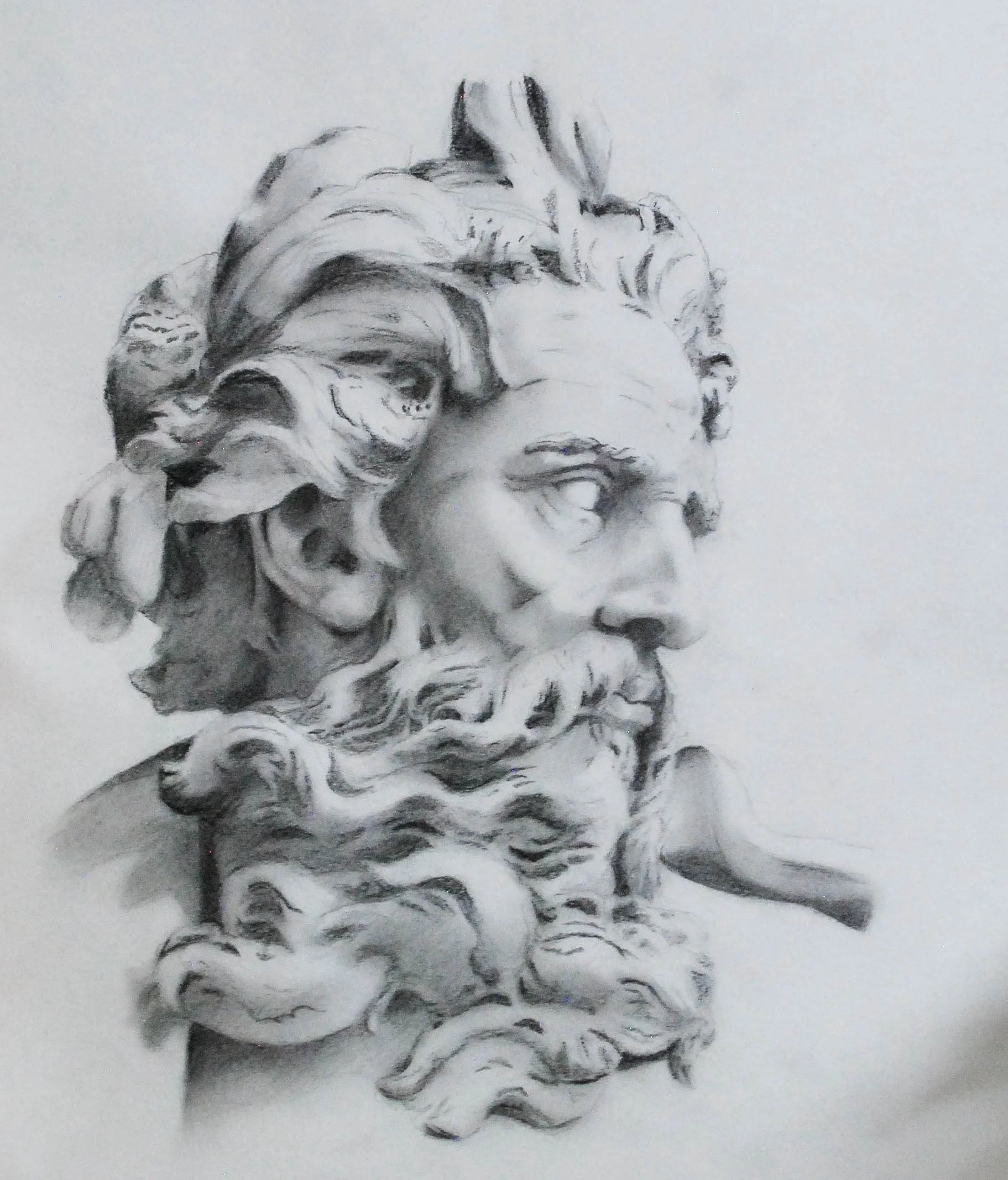 A detailed pencil drawing of a classical sculpture of a bearded man with flowing hair, facing to the right.