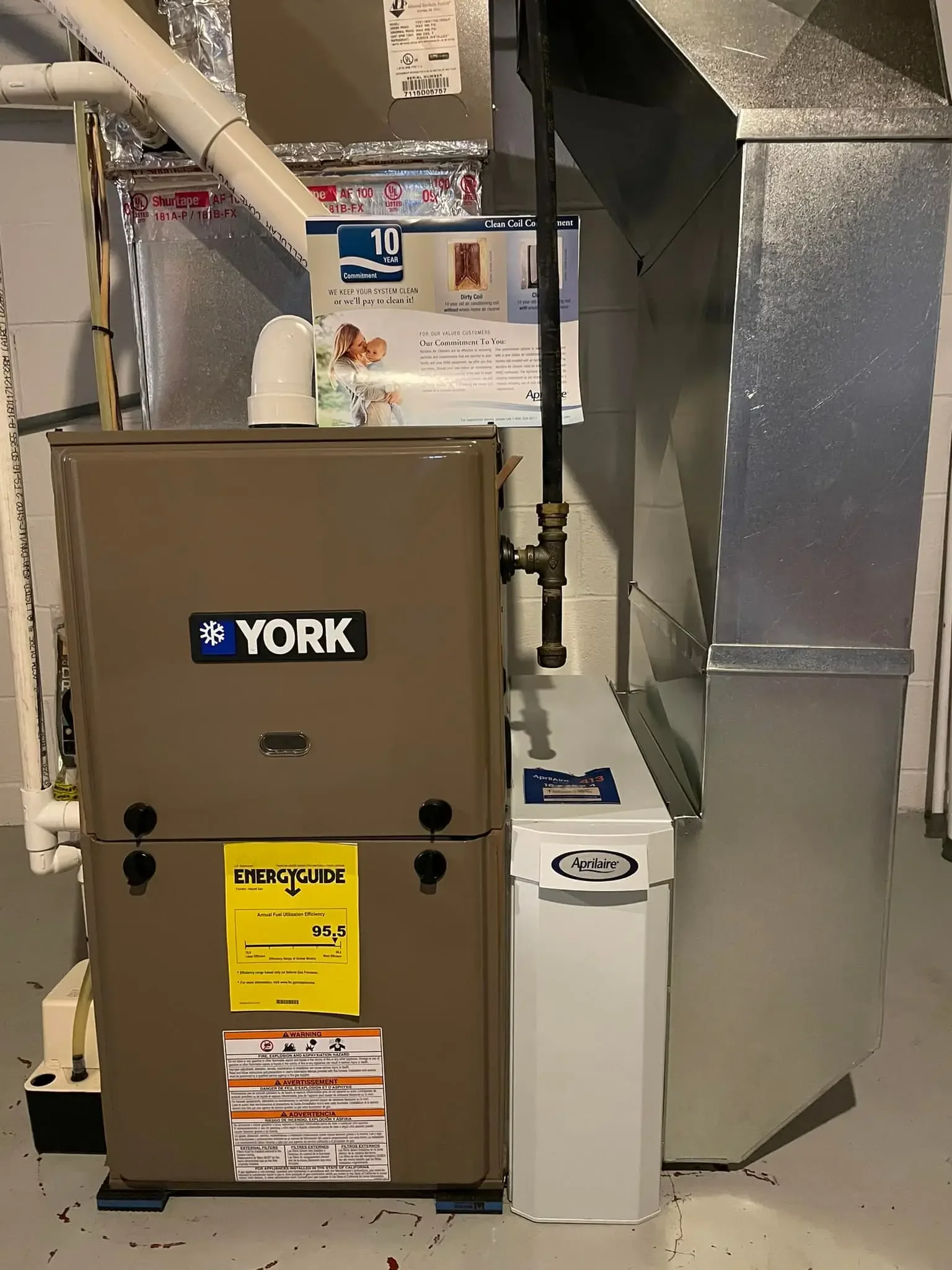 Hvac furnace with York brand label in a utility room.