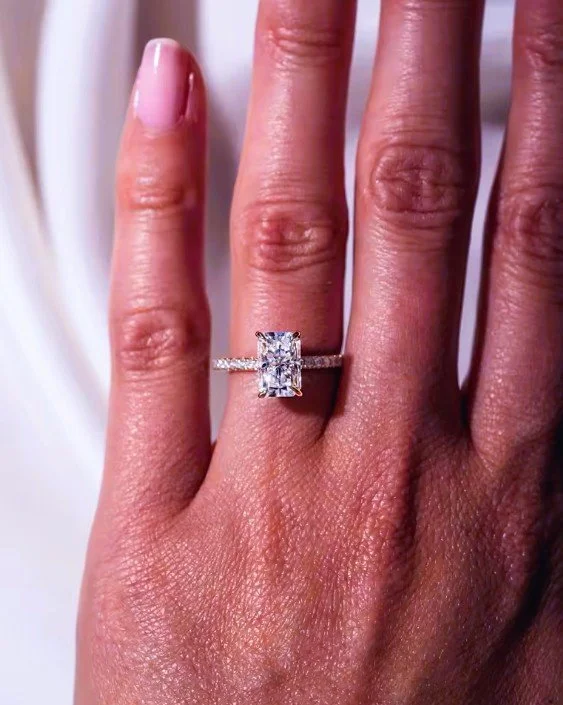 Brilliant Rectangle Diamond ring Pave band 4 prong setting 14k yellow gold Mr Jeweller on ring finger.jpg