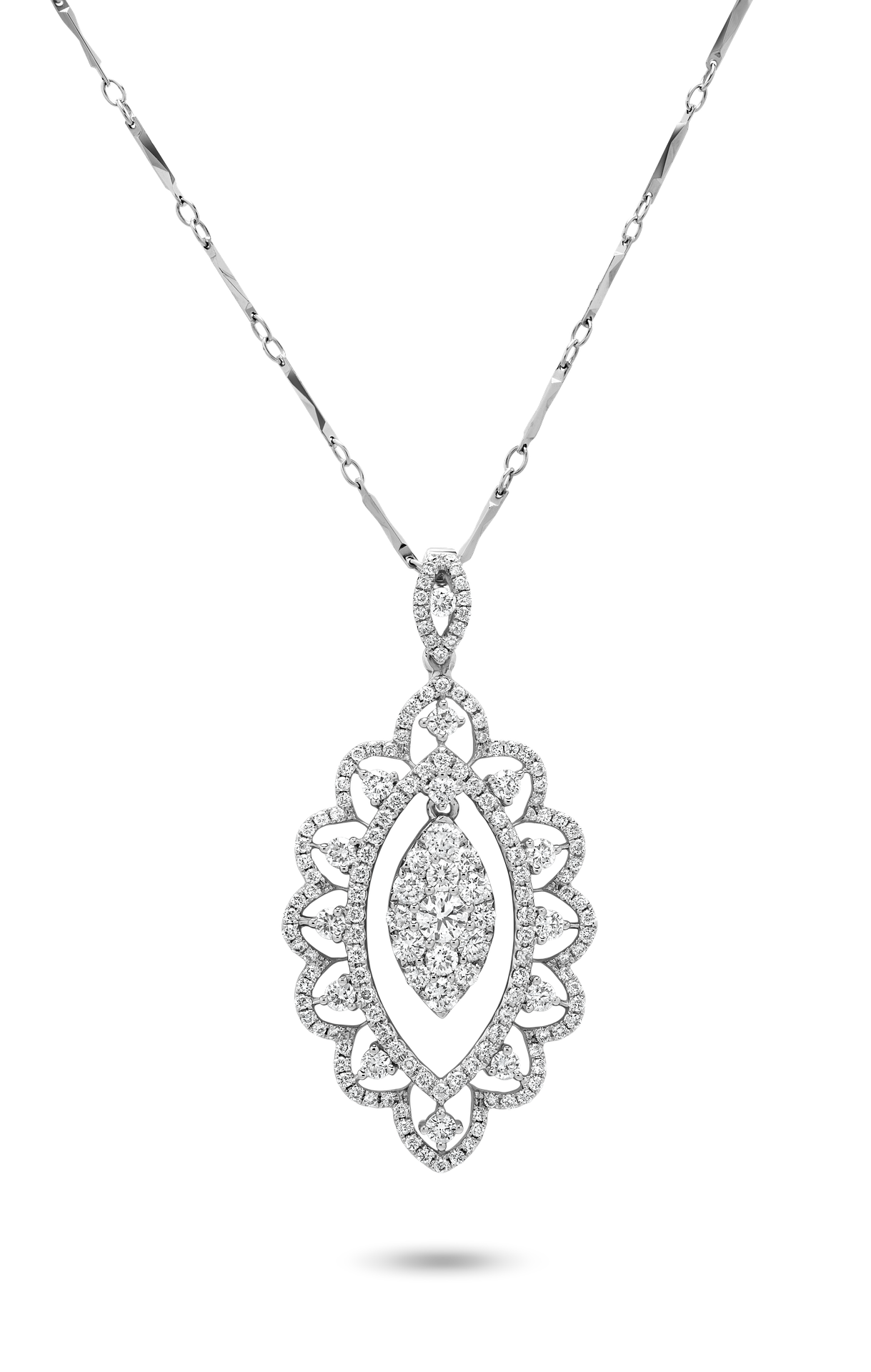 A silver necklace with a large, ornate pendant encrusted with diamonds, displayed against a black background.