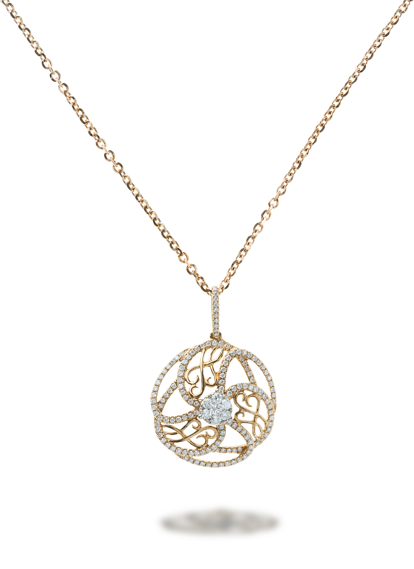 A gold necklace with a round pendant adorned with diamonds and intricate designs, including the word 'love' in cursive.