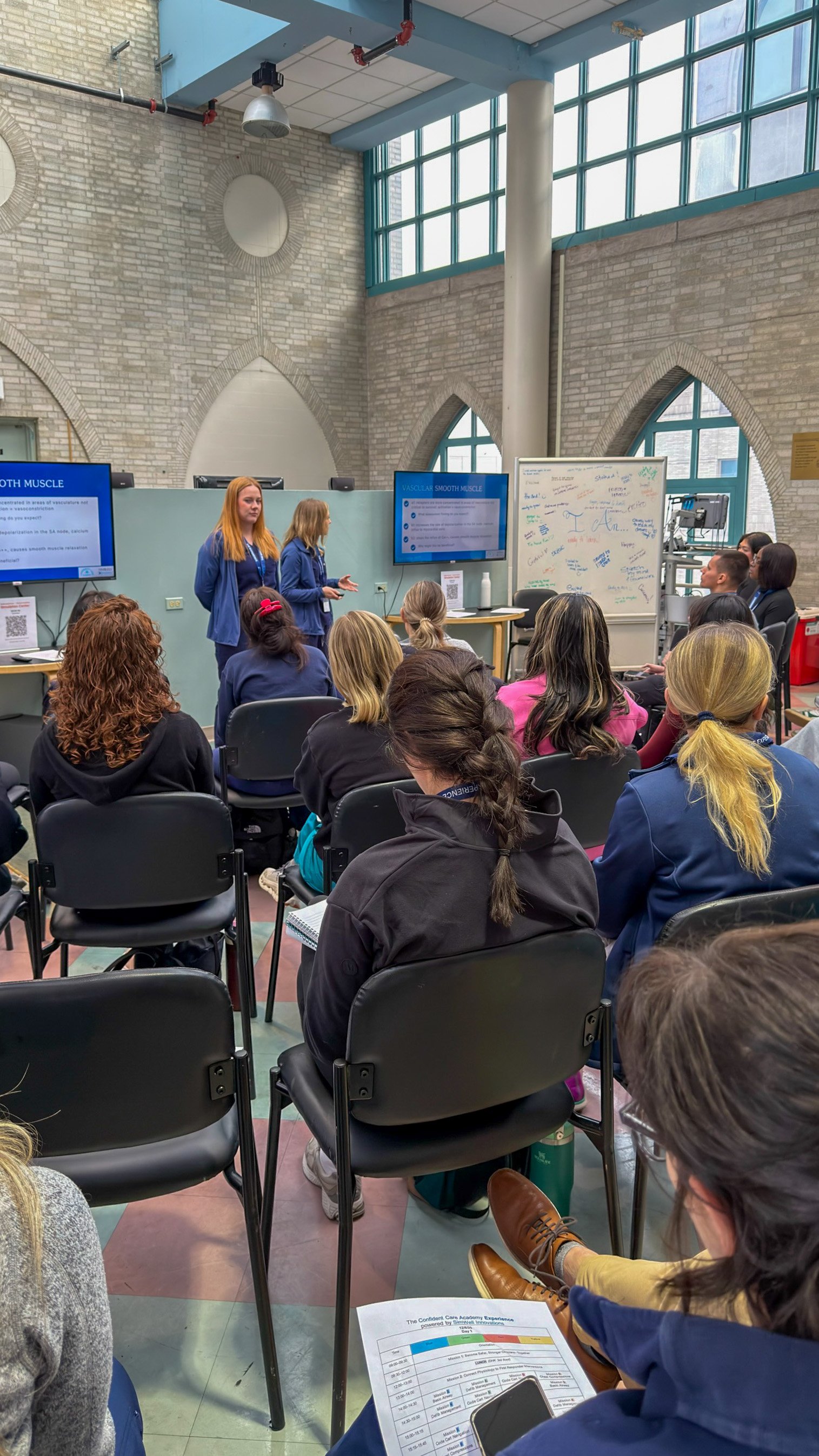 Nurses attend a critical care physiology lecture on vascular smooth muscle at the Confident Care Experience.