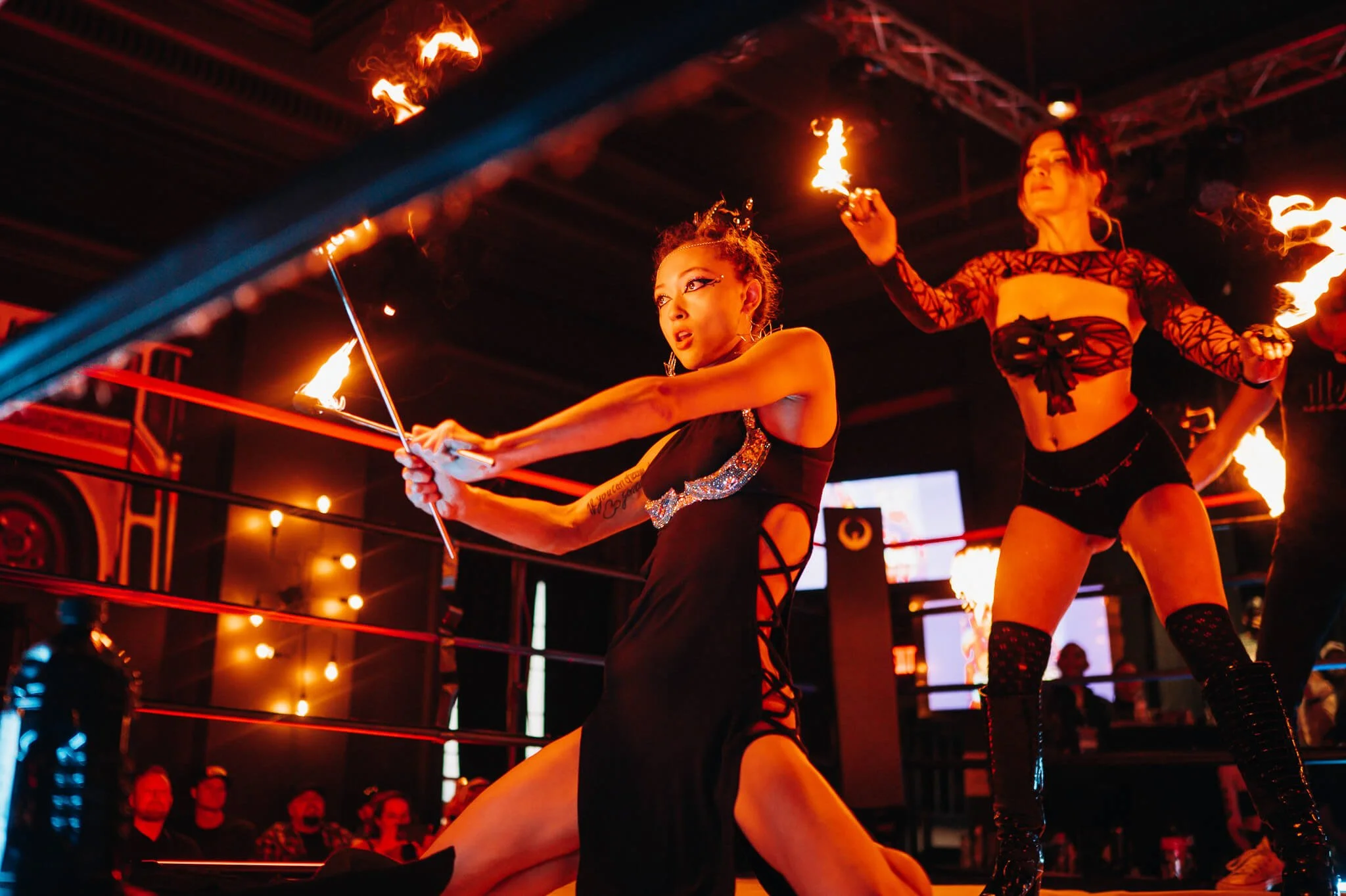 Live fire performers inside the ring at All City Fight Night event in Everett Washington