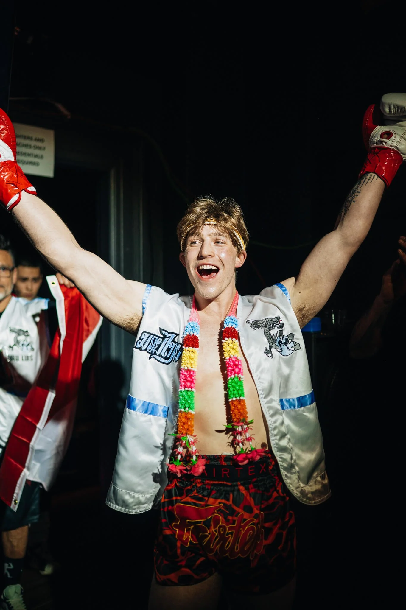 Muay Thai fighter celebrating entrance at All City Fight Night event in Everett Washington