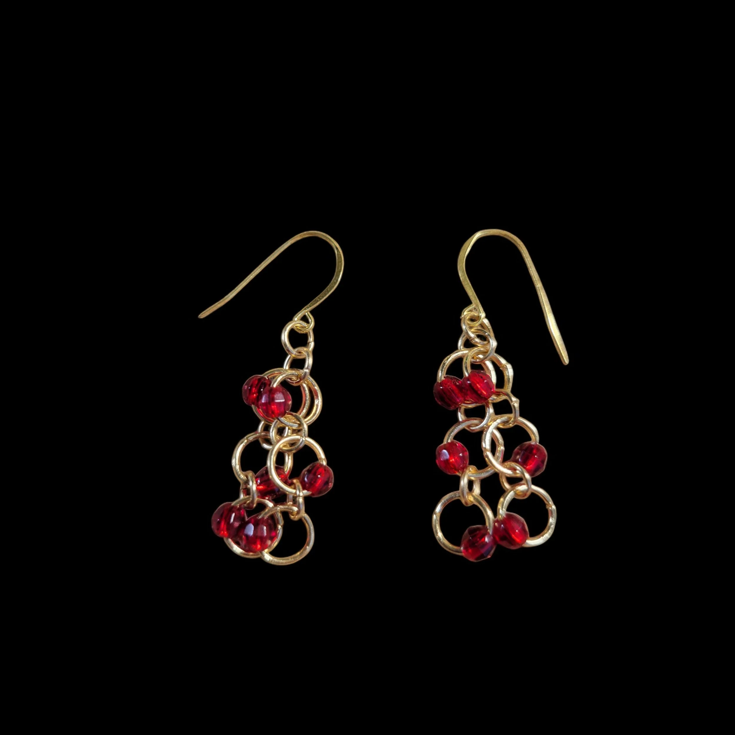 E053 Red crystal. gold metal chain earrings.jpeg