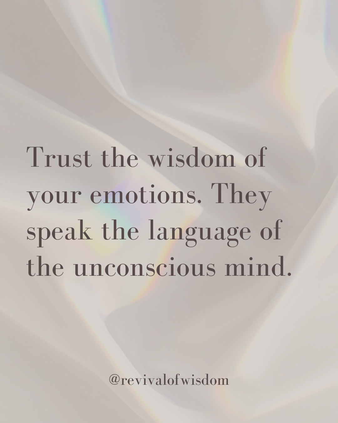 Inspirational quote on a soft, light-colored background with subtle rainbow effects, reading: 'Trust the wisdom of your emotions. They speak the language of the unconscious mind.' @revivalofwisdom