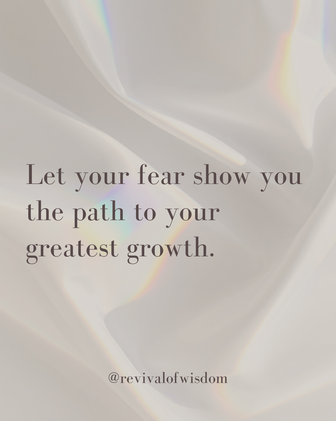 Inspirational quote on a soft, iridescent background: 'Let your fear show you the path to your greatest growth.'