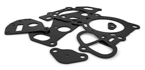 Collection of EPDM foam gaskets spread out on a white background.