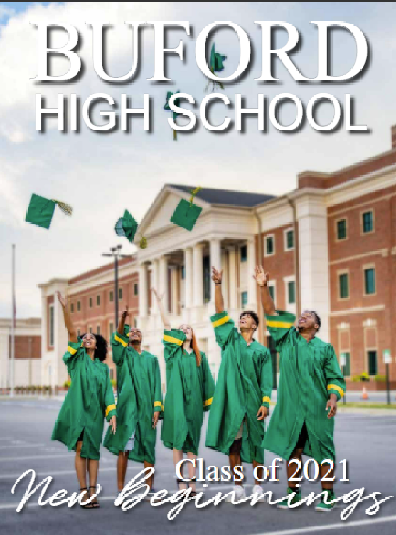 High school graduation photo with graduates in green gowns and mortarboards outside a school building, celebrating and tossing caps in the air.