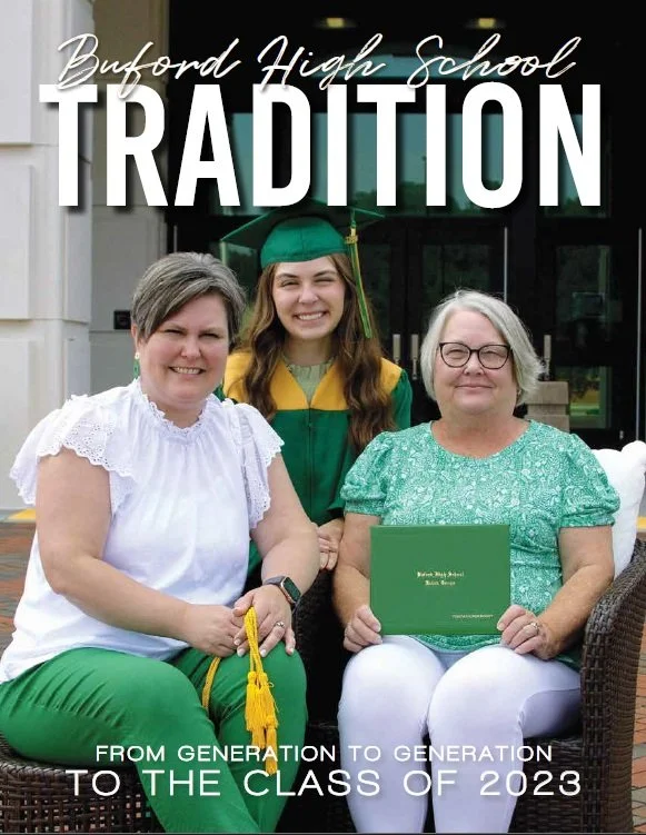 Three women seated outdoors in front of a building, with a young woman in a green and yellow graduation gown and cap standing behind them. The image is a high school graduation celebration. The text reads 'Buford High School TRADITION' and 'FROM GENE
