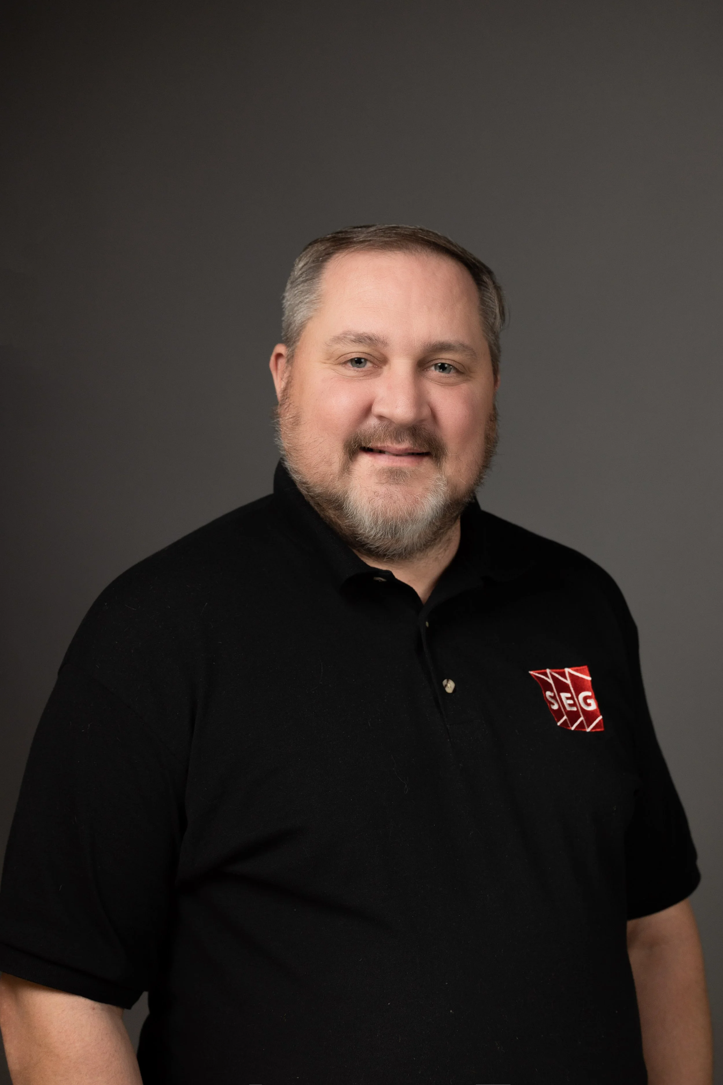 Professional headshot for Dallas real estate agent by LuxeAngle Media.