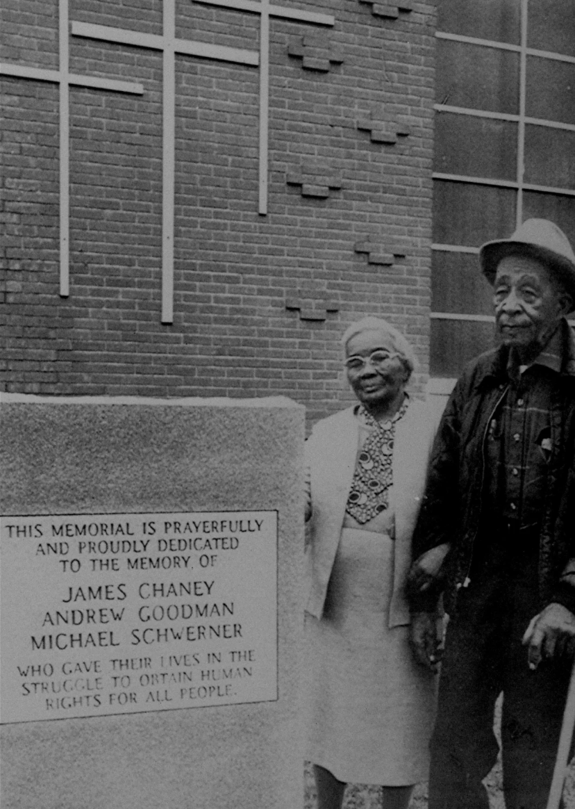 J.R. "Bud" and Beatrice Cole show the memorial marker in Neshoba County, Miss., January 6, 1989, to James Chaney, Andrew Goodman, and Michael Schwerner. Mt. Zion Methodist Church, burned by the Ku Klux Klan five days before the murders is behind the 
