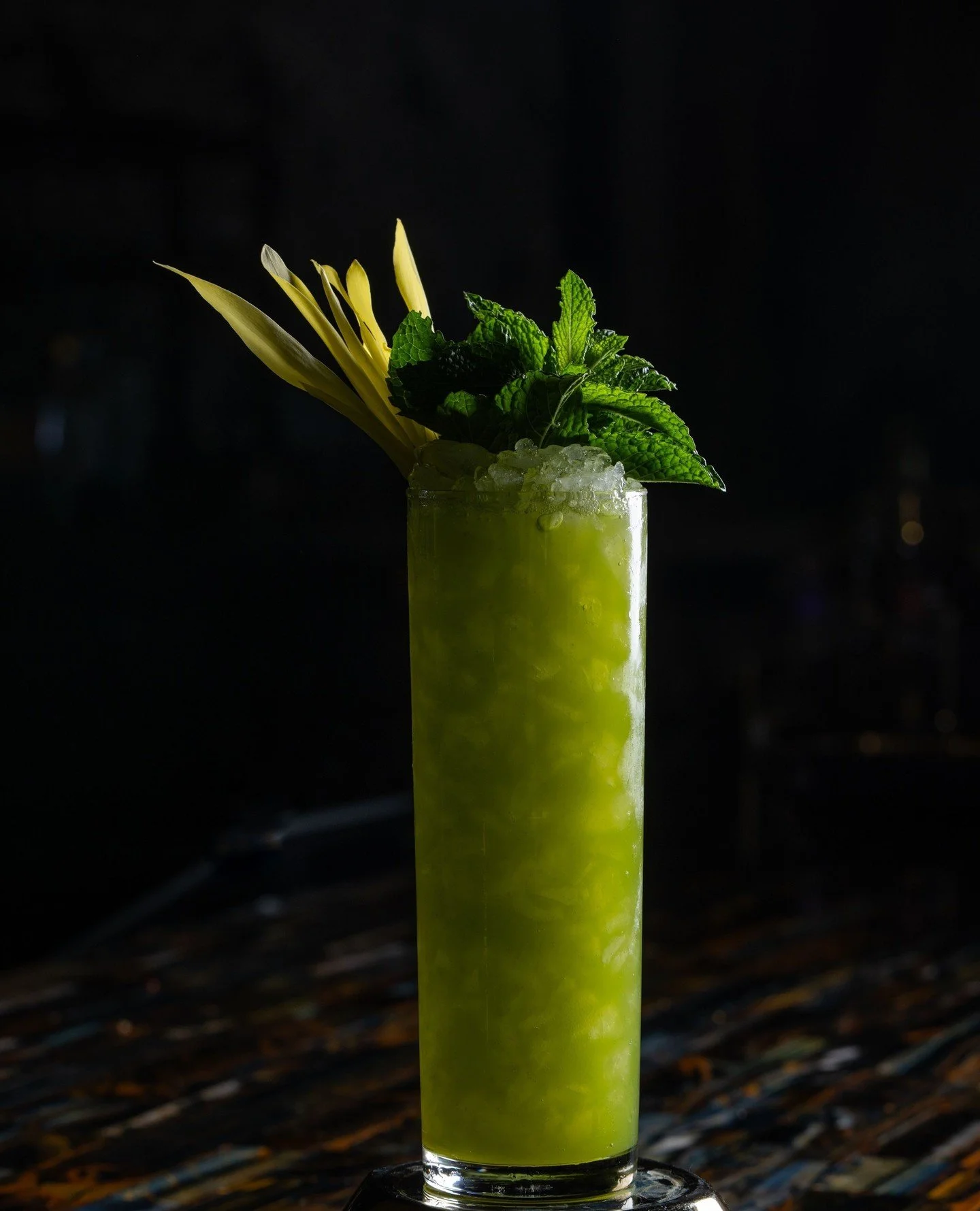 The Kodama brings together tequila, white rum, pineapple, lime, mint, cilantro, and thai chili for a cocktail that looks like health and tastes like a vacation.