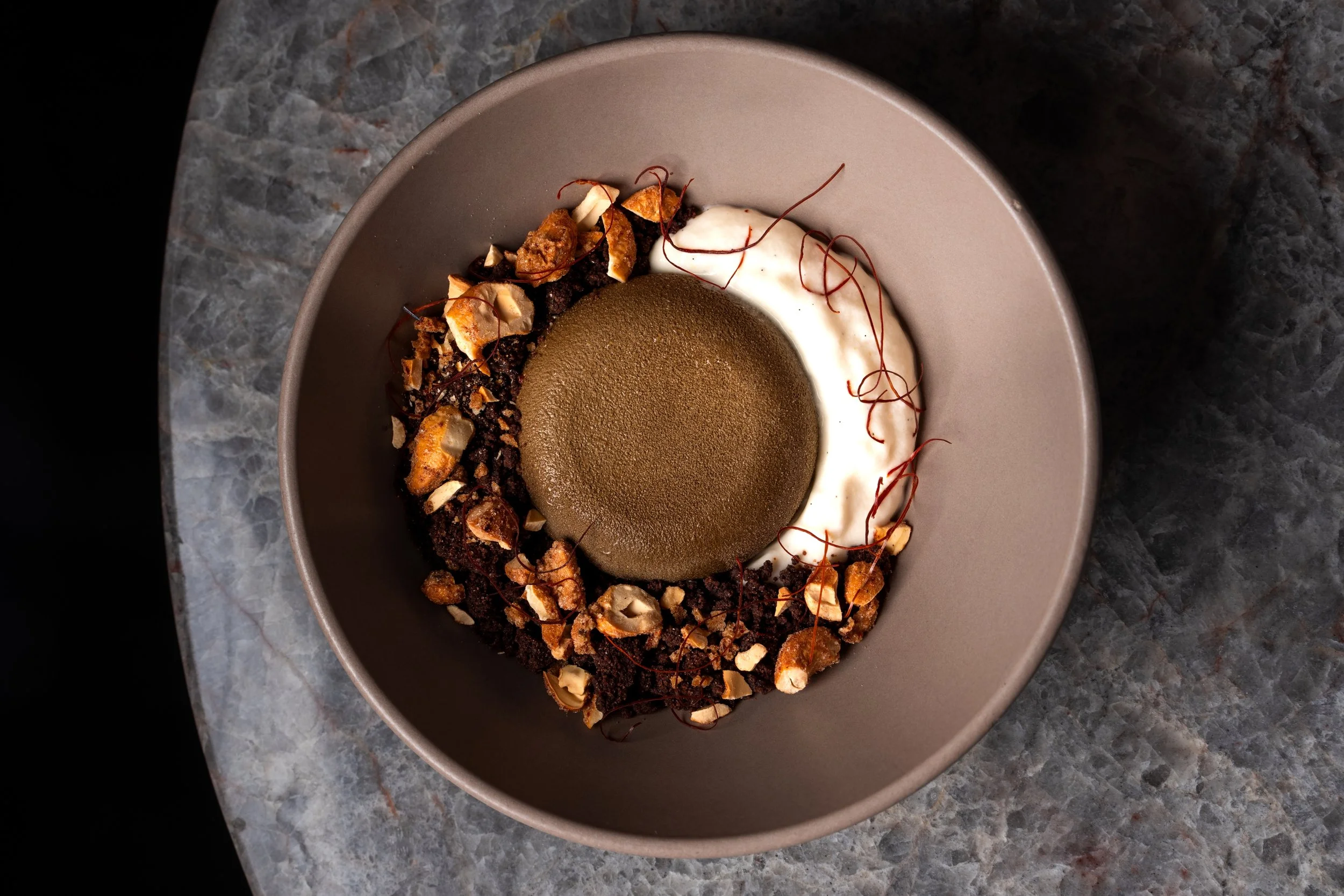 Chocolate cremeux with miso sesame foam, chocolate crumble, and Korean chili cashews at Animae San Diego