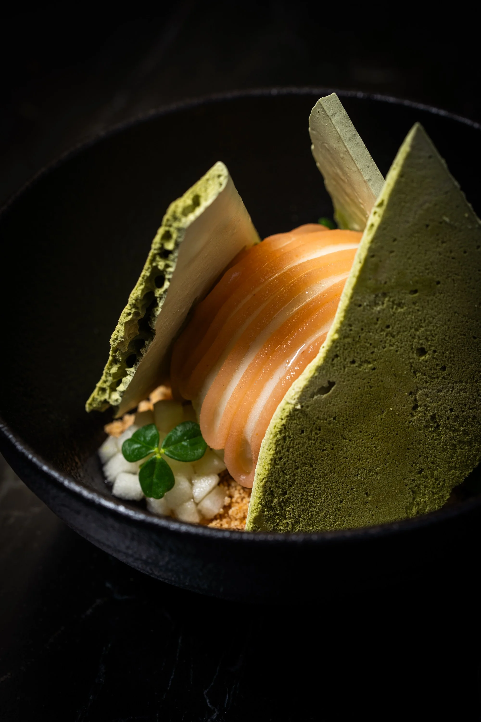 Peach sorbet with matcha cream, coconut crumble, and matcha tuile at Animae San Diego