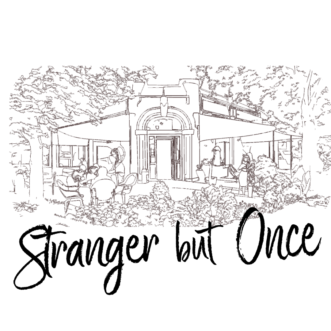 Outline drawing of a lively outdoor restaurant or cafe with tables, chairs, and people dining, surrounded by trees and greenery, with a central arched doorway.