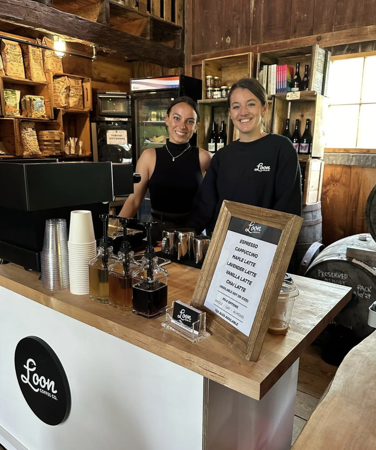 Loon Coffee Co. baristas serving espresso drinks at a catered event