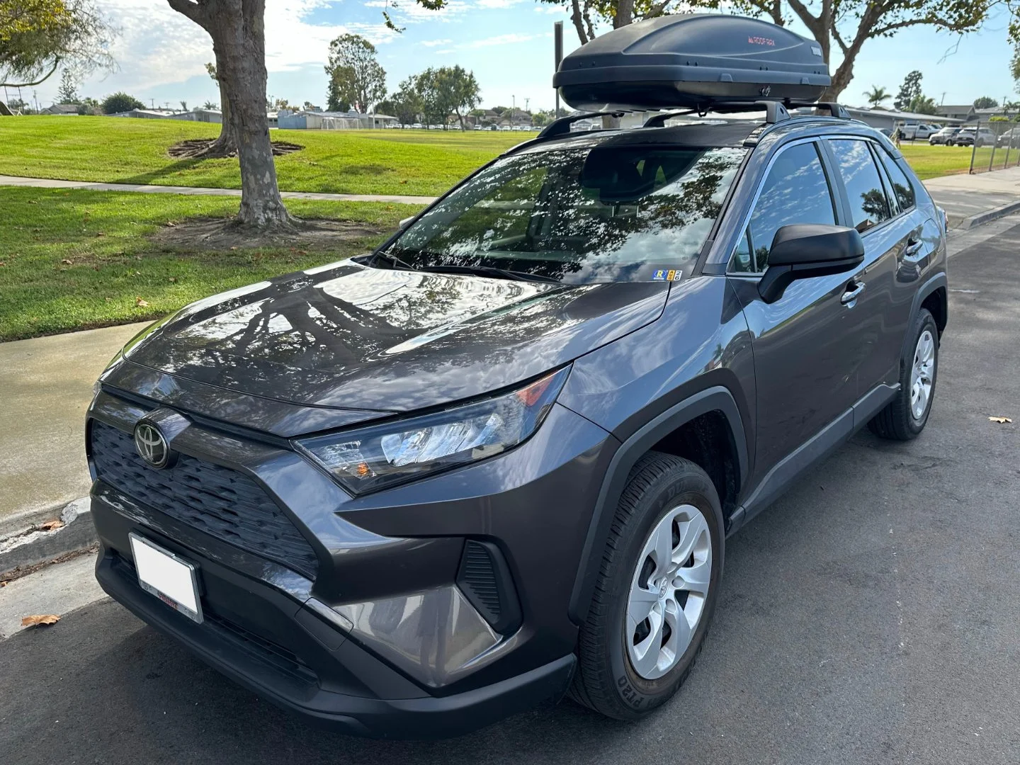 Toyota RAV4 with roof cargo box installed by Roof Rax