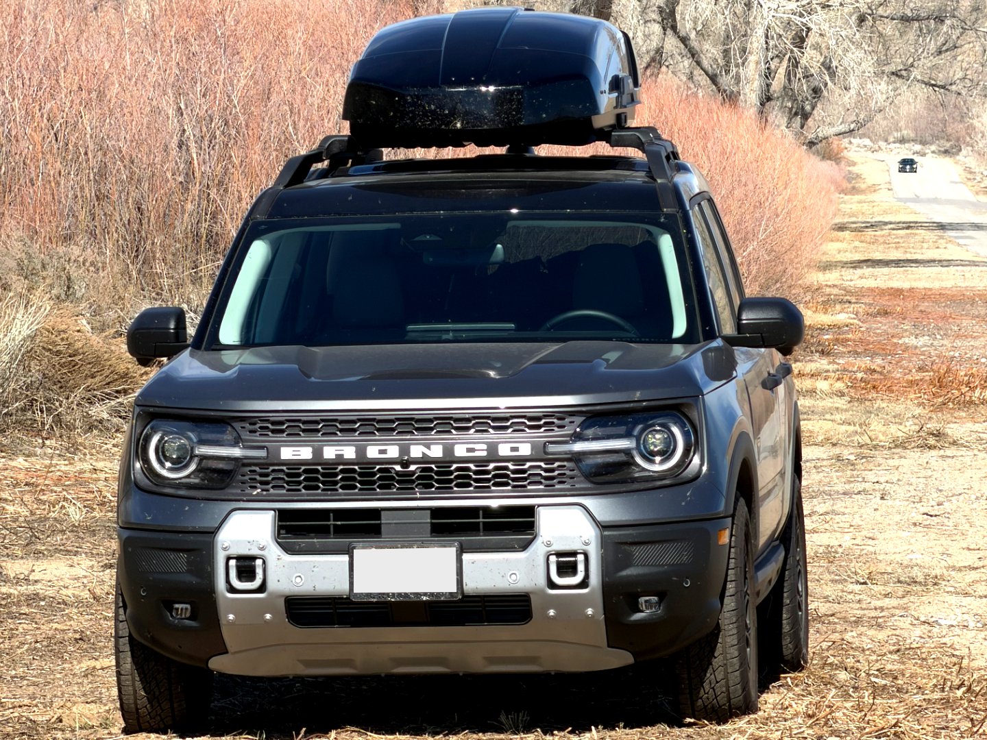 Ford Bronco with roof cargo box installed on SUV