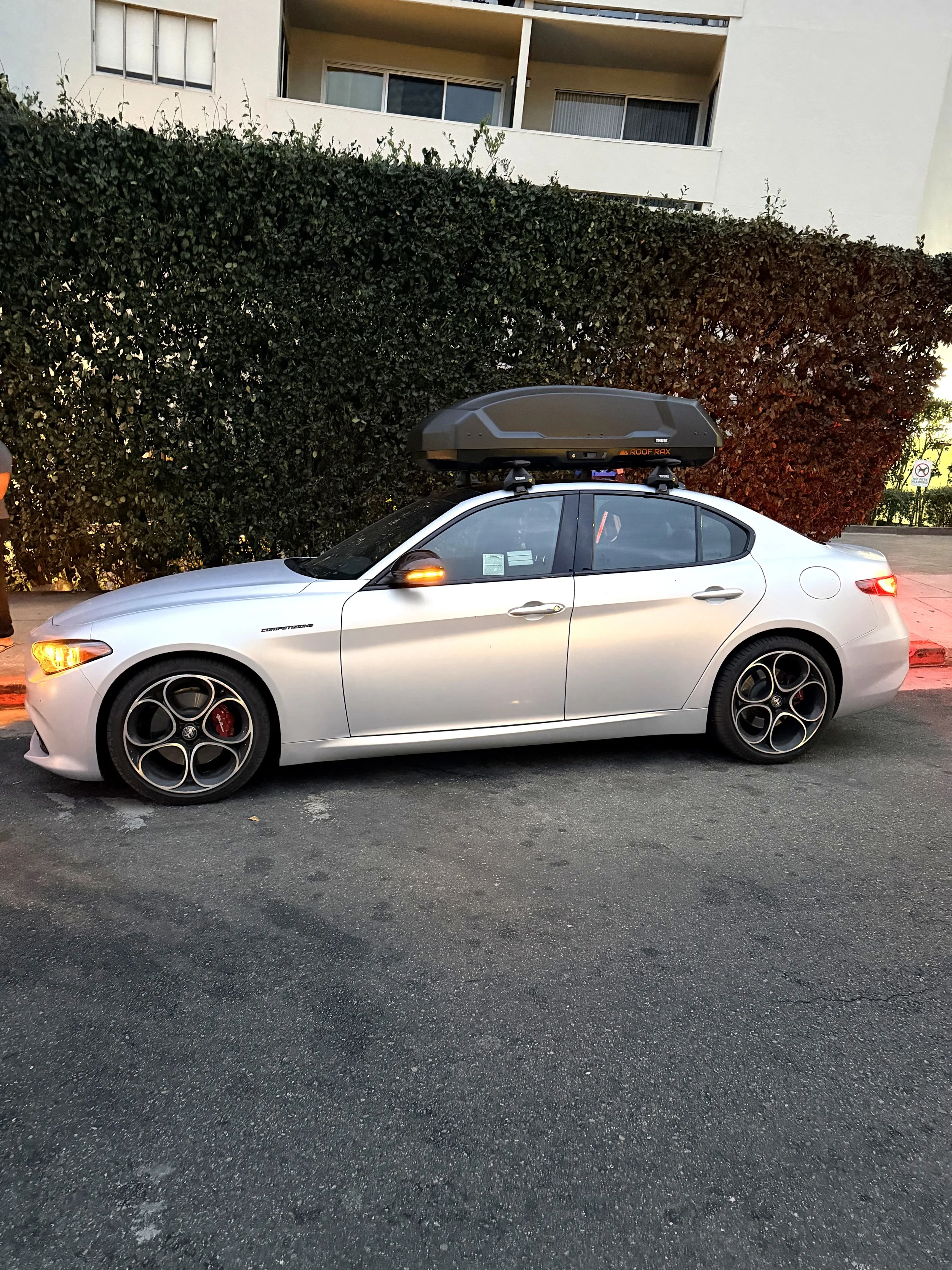 Alfa Romeo with roof cargo box in Hollywood, Los Angeles