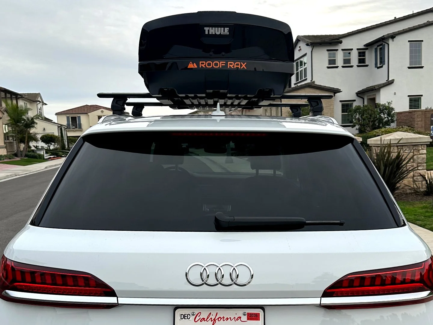 Thule roof cargo box mounted on vehicle crossbars