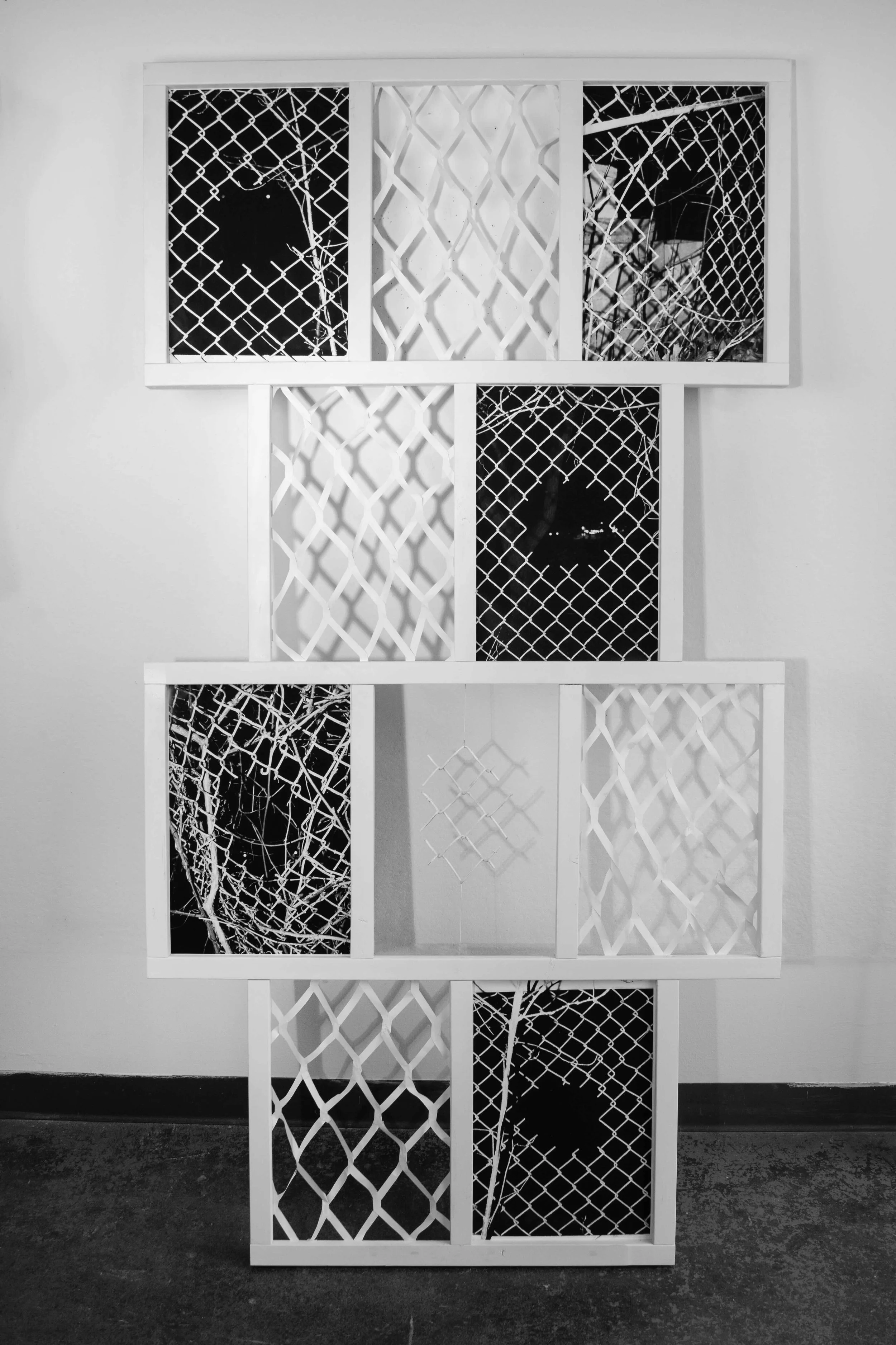 Good Fences
2025
chain link fence, paper, photos and wood
4’ x 2” x 6‘7”