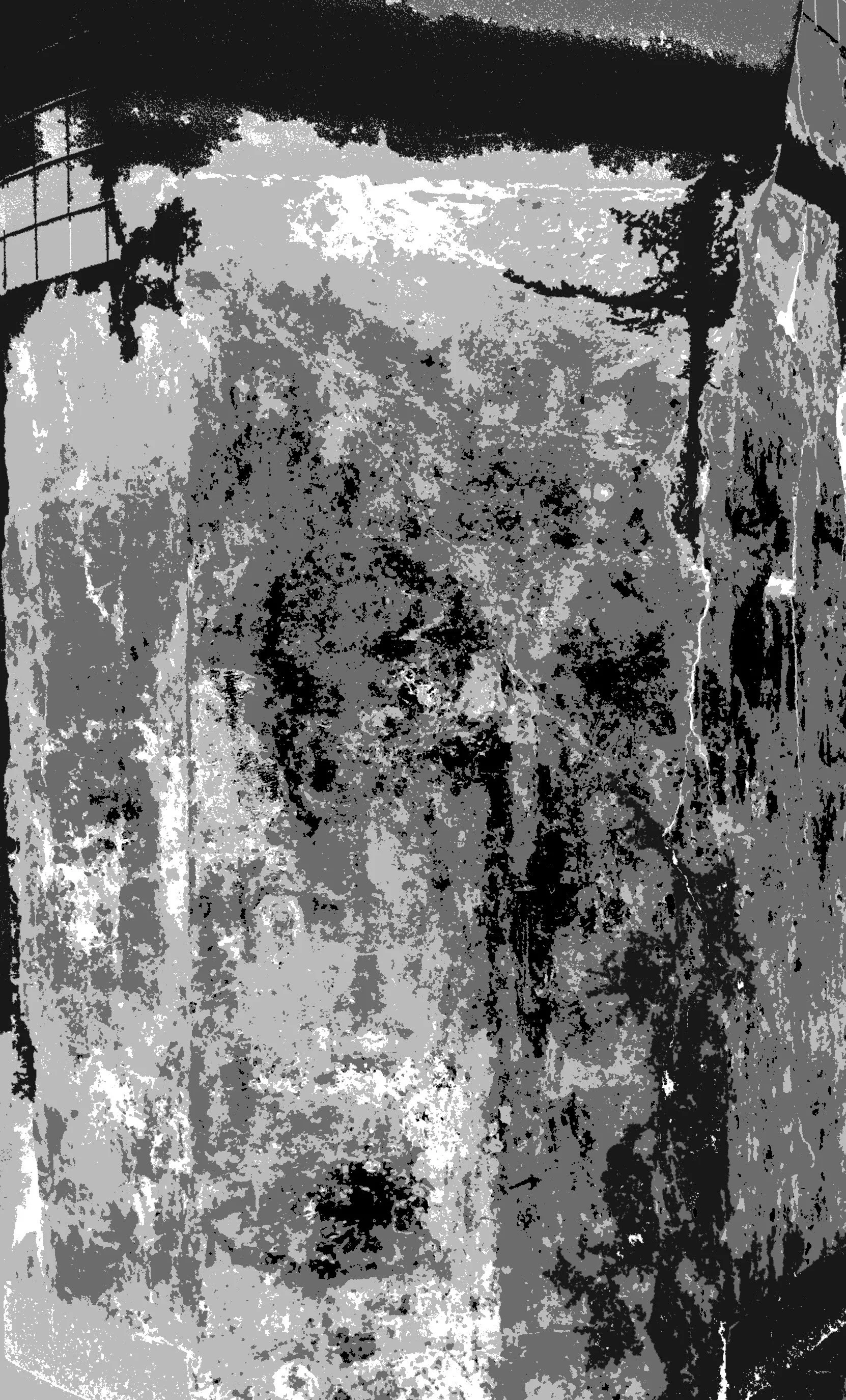 Close-up of a weathered wooden surface with peeling paint and textured grain.
