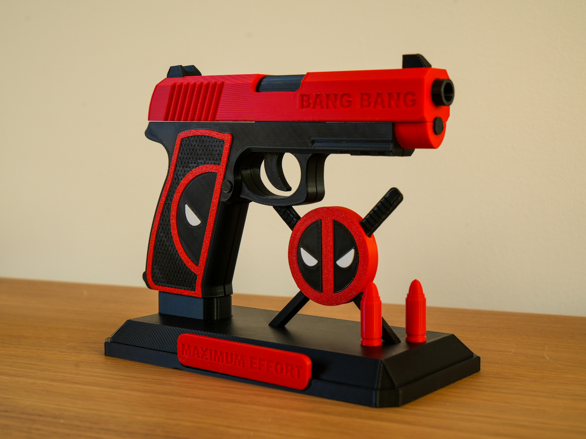 Deadpool's gun + its base.png