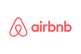 Airbnb logo with red icon and text