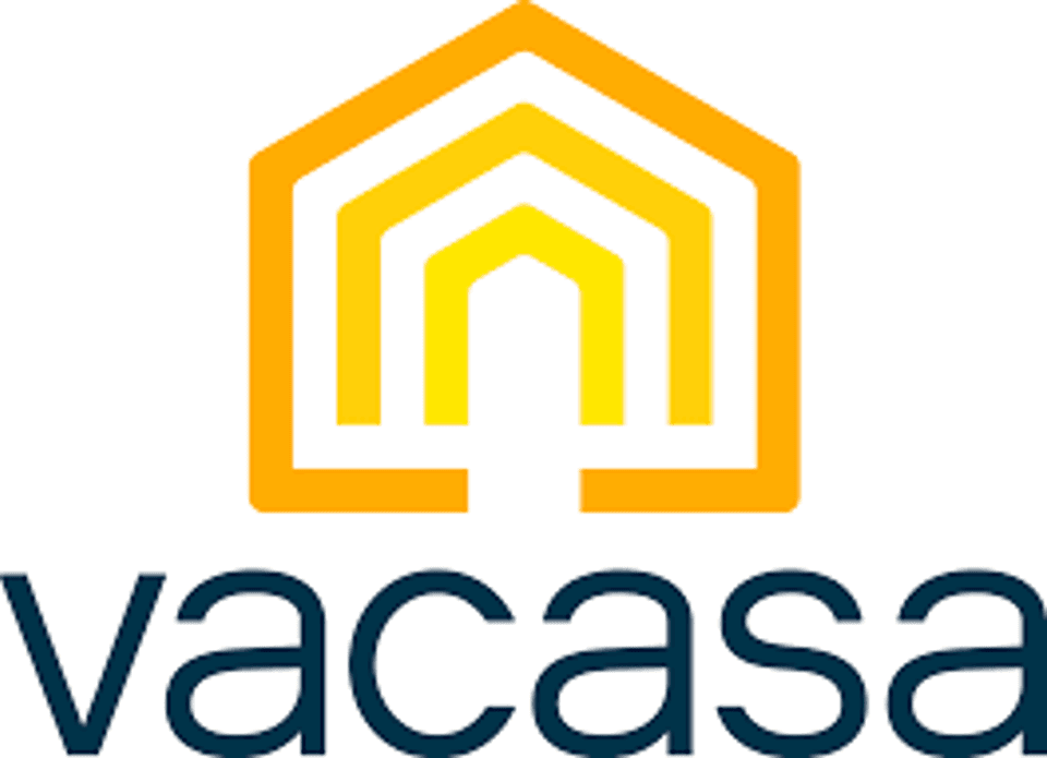 Logo with a stylized house outline in orange and yellow above the word 'vacasaa'.