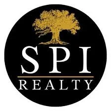 Logo for SPI Realty featuring a gold tree above the company name in white and gold on a black circular background.
