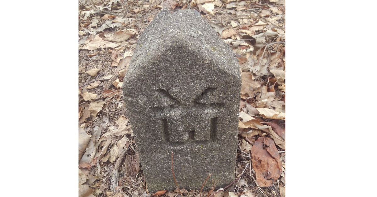 Existing land marker used for boundary confirmation and site evaluation.
