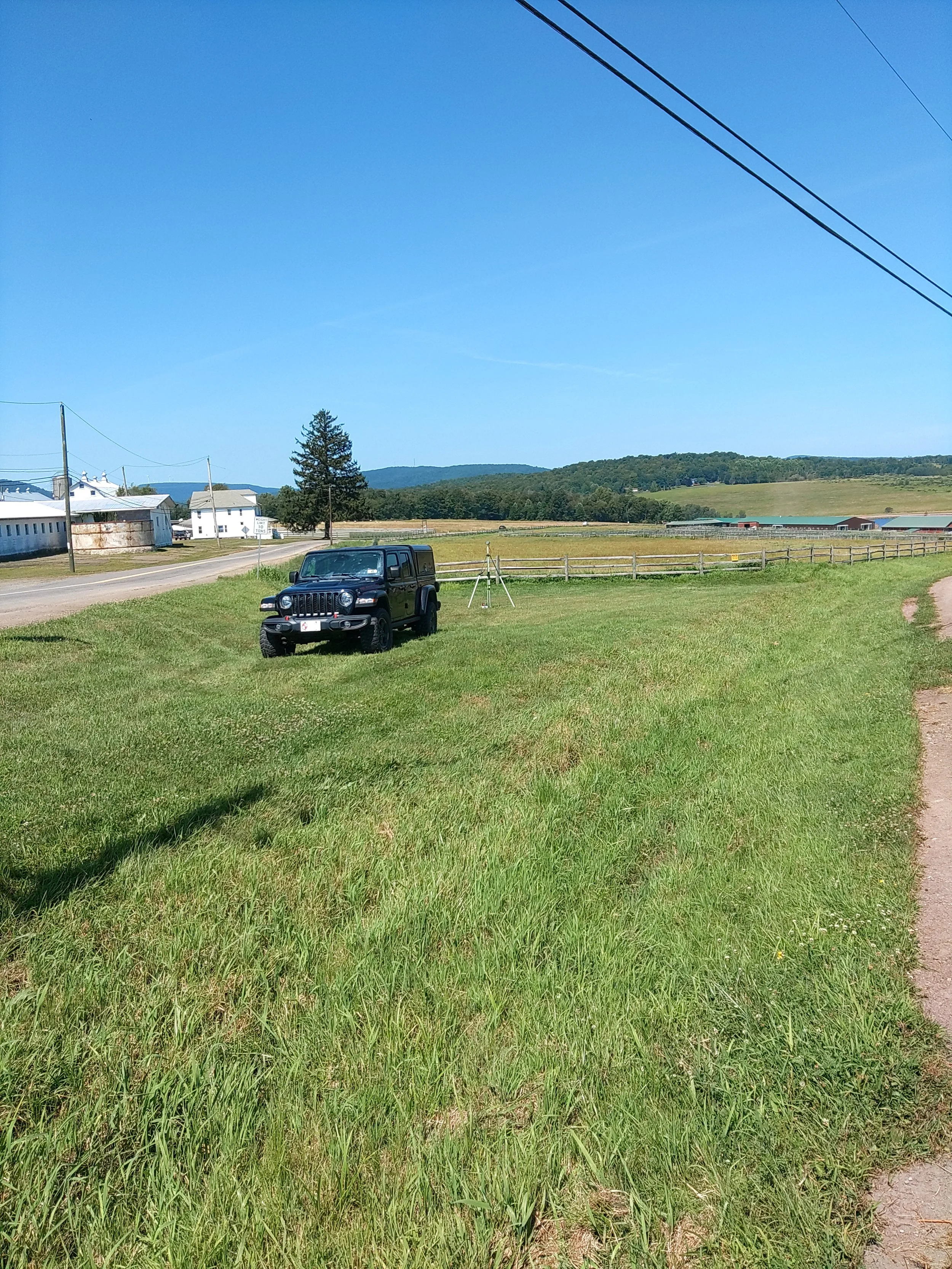 Survey crew equipment supporting boundary evaluation before property transfer.