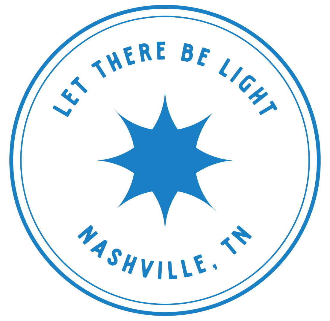 A circular badge with the text 'Let There Be Light' at the top and 'Nashville, TN' at the bottom, featuring a central blue starburst symbol.