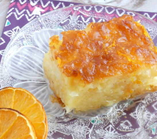 Portokalopita — A moist Greek orange cake made with phyllo pastry and soaked in a fragrant citrus syrup.