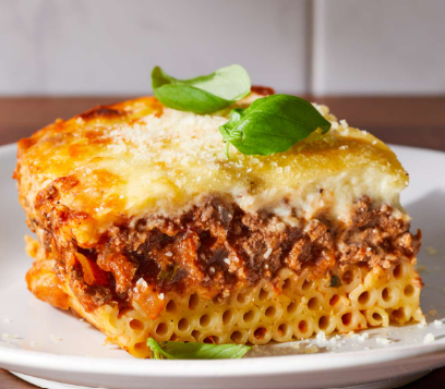 Pastitsio - Our “Greek lasagna” with seasoned ground beef layered over macaroni and topped with a thick, creamy béchamel sauce.