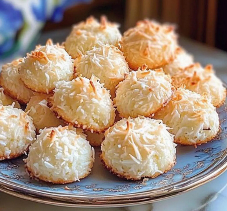 Macaroons — Chewy coconut cookies baked until lightly golden with a sweet, delicate texture.